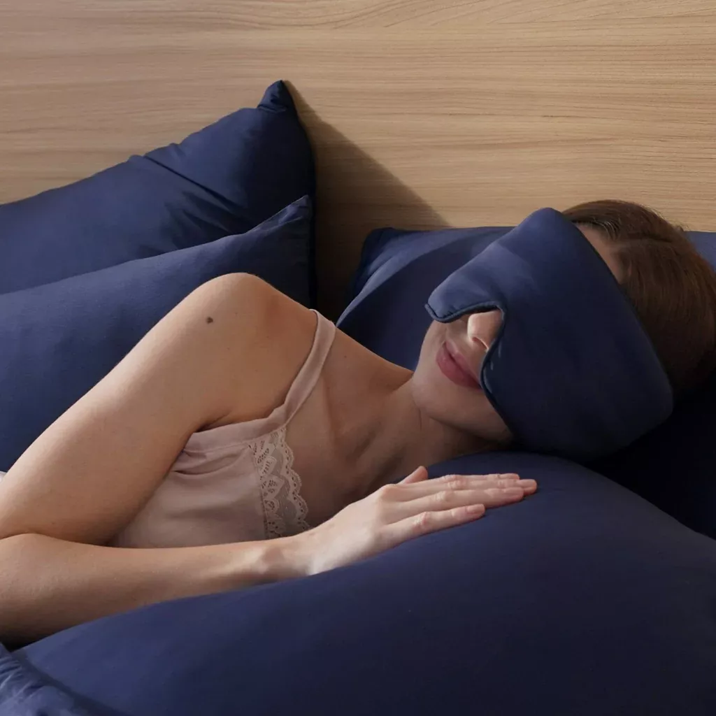 Woman wearing a sleep mask